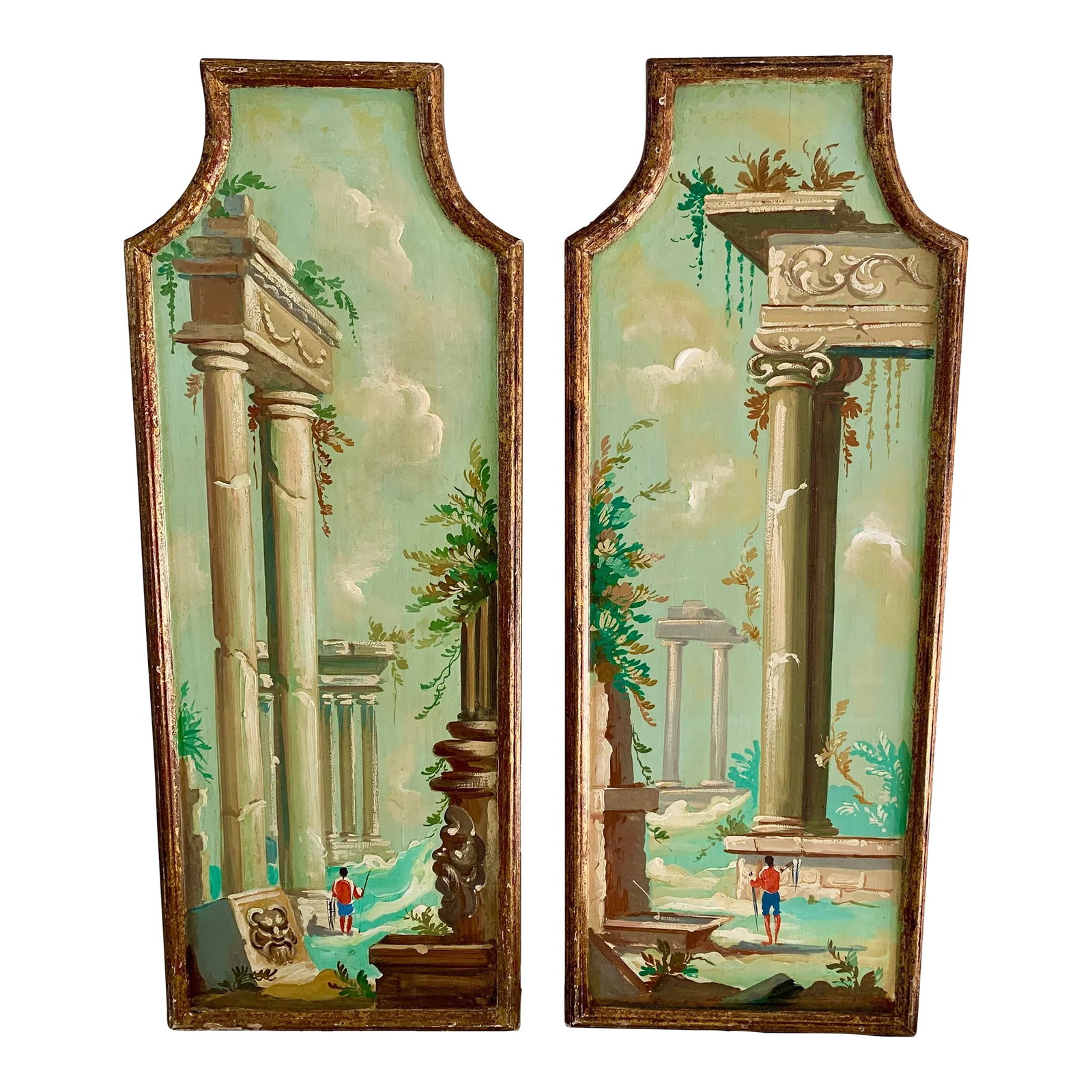 Antique Grand Tour Italian Capriccio Framed Oil on Board Paintings of a Landscape With Ruins, Pair: A distinctive pair of Italian capriccio landscapes, painted in oil on shaped panels and presented in softly worn giltwood frames. The compositions draw from the Grand Tour tradition-romanticized ruins