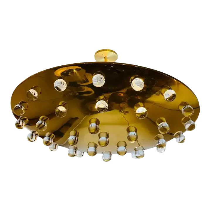 Grand French 1960s Crystal Flush Ceiling Light, Midcentury: A beautiful luxurious large golden flush pendant with 32 solid glass crystal orbs . The pendant emits light upward as well as through the glass orbs. 5 light candelabra light sockets. Rewired and