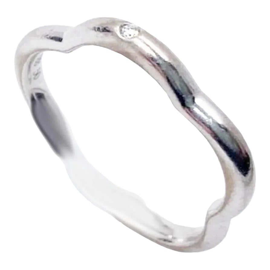 Chanel 18k 750 White Gold Camellia 1 Diamond Ring: This is part of Chairish's Fine Jewelry assortment. Chanel 18k 750 White Gold Camellia 1 Diamond Ring *Marked Chanel *Comes with the original boxes and certificate *Serial #:S14xxx -Fr size 49 / us