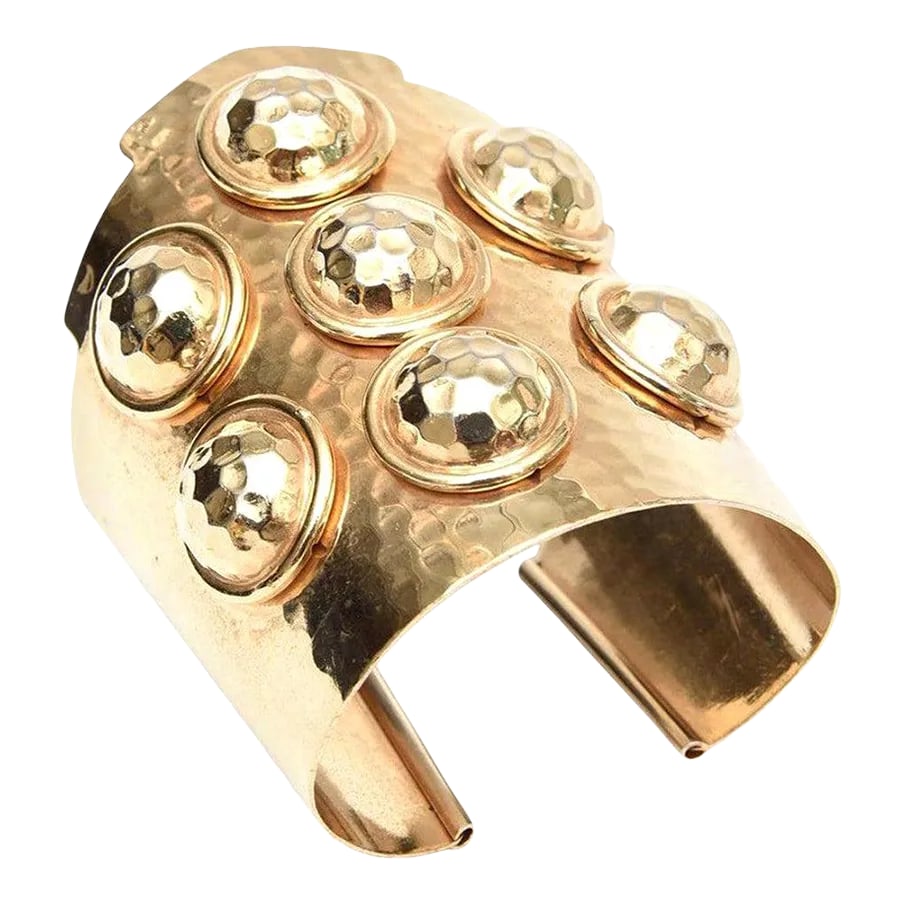Vintage Brass Hand Hammered Wide Cuff Bracelet With Seven Raised Disks: This is part of Chairish's Costume Jewelry assortment. This arresting vintage hand hammered wide and sculptural vintage brass cuff bracelet has 7 round brass hand hammered dimensional disks on the