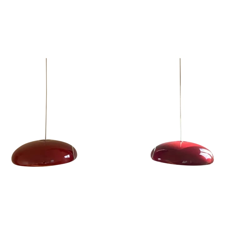 Contemporary Fontana Arte Pangen Pendant Light Fixtures - a Pair: Two beautiful FontanaArte Pangen pendant light fixtures with hardware for suspension mounting. Brand new; never used. Perfect for over a dining room table or kitchen island. Condition: Imperfections: