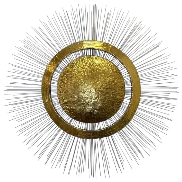 Late 20th Century Vintage Brass & Steel Sunburst Wall Sculpture: This large and impressive piece is comprised of a heavy brass center and concentric ring accented by hundreds of steel rods. Brutalism influence is evident. The piece is not signed, but is in