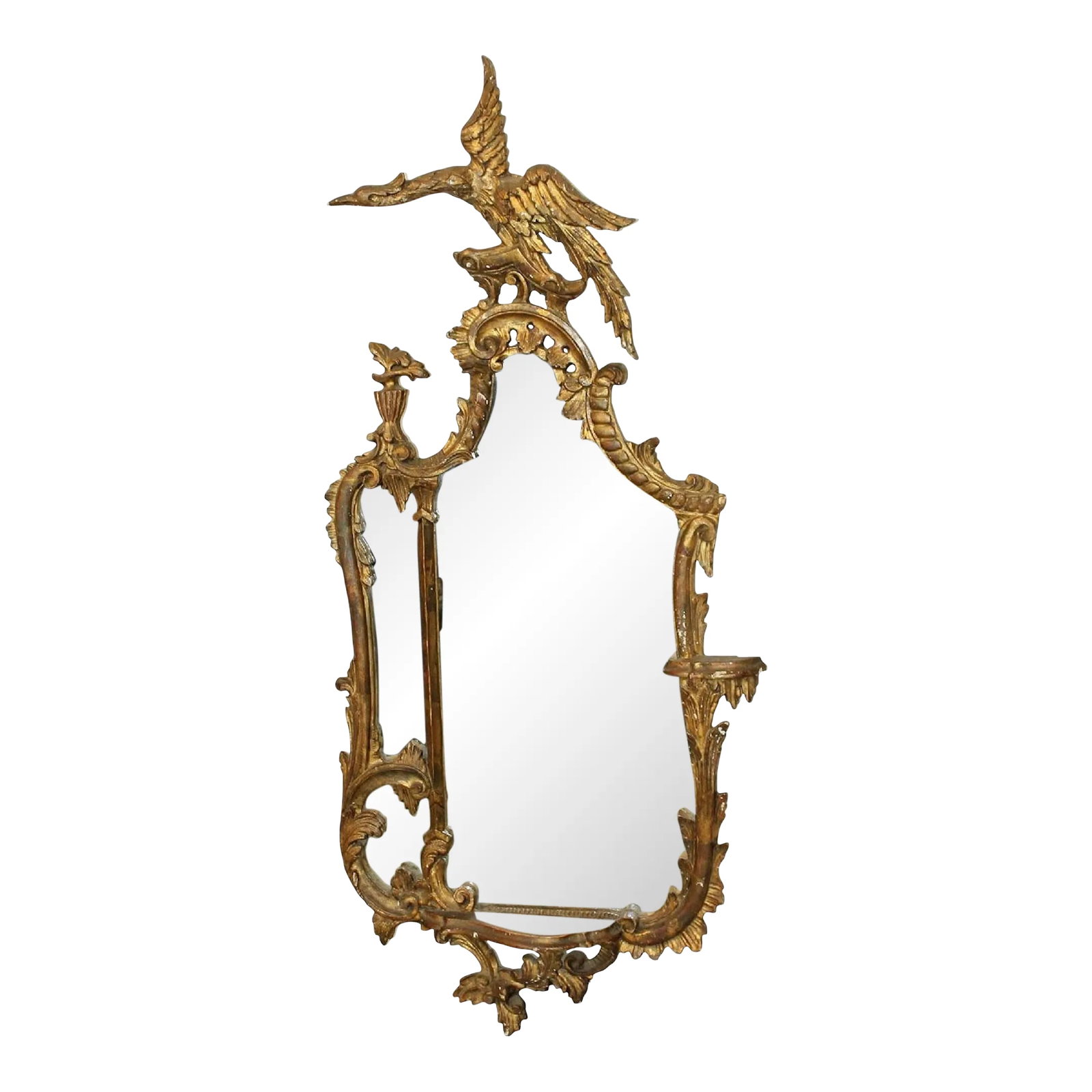 Vintage Chippendale Giltwood Eagle Mirror: Vintage Chippendale giltwood eagle mirror with segmented asymmetrical mirror surfaces .Small side bracket style shelf. No maker's marks. Condition: Alterations: Original Condition Unaltered