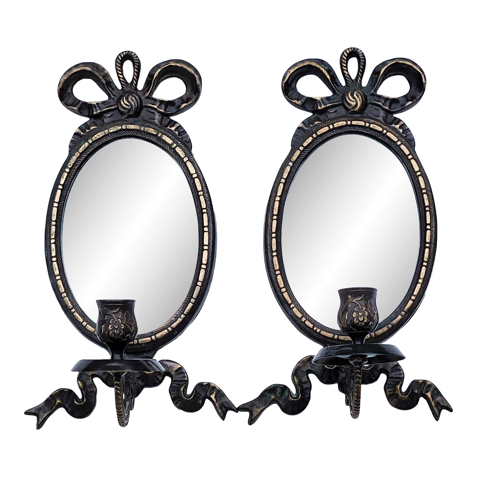 Pair of Vintage Ornate French Style Brass Mirrored Sconces With Ribbon Bow: Pair of Vintage Ornate French Style Brass Mirrored Sconces with Ribbon Bow These beautiful sconces represent elegant French design with bows and ribbons. Each candle cup features floral pattern and ho