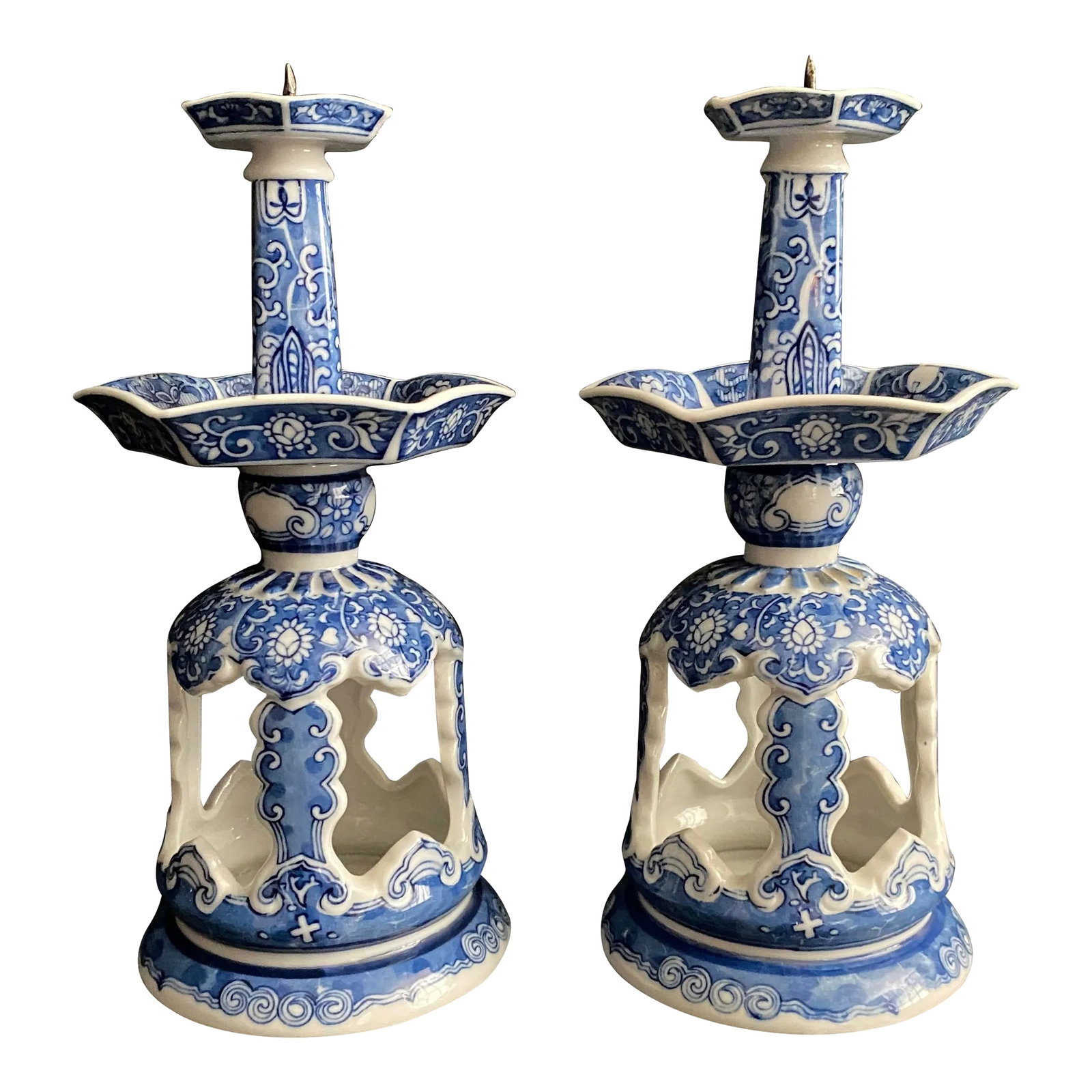 Vintage Pair of Chinese Pierced Porcelain Blue & White Candlesticks: Blue and white decorated porcelain candlesticks with pierced dome base, hexagonal drip pans and 6 sided candle cup with pricket. Unmarked. Condition: Alterations: Original Condition Unaltered