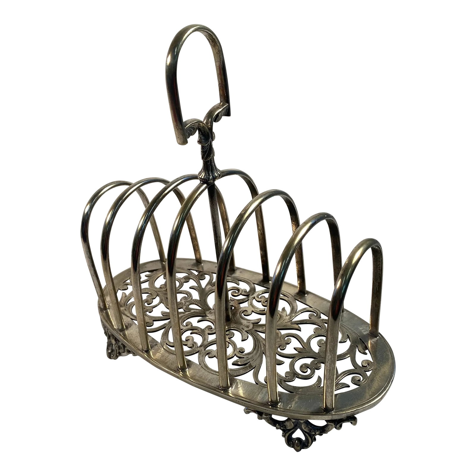 Late 19th Century Victorian, Scroll, Toast Rack: This Victorian silver plate toast rack has it all. Great attention to detail. Stunning scroll work, footed bottom, and six partition slots to serve in style. There are a lot of toast racks, but this