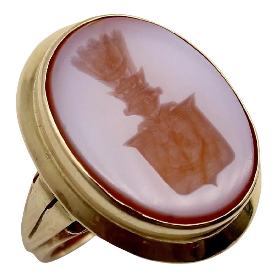 Victorian 14k Gold Banded Agate Intaglio Signet Ring with Shield Size 7.5: This is part of Chairish's Fine Jewelry assortment. Set in 14k gold, the banded agate intaglio ring is hand-carved with a unique image: a shield topped by a knight's helmet and a plume of feathers.