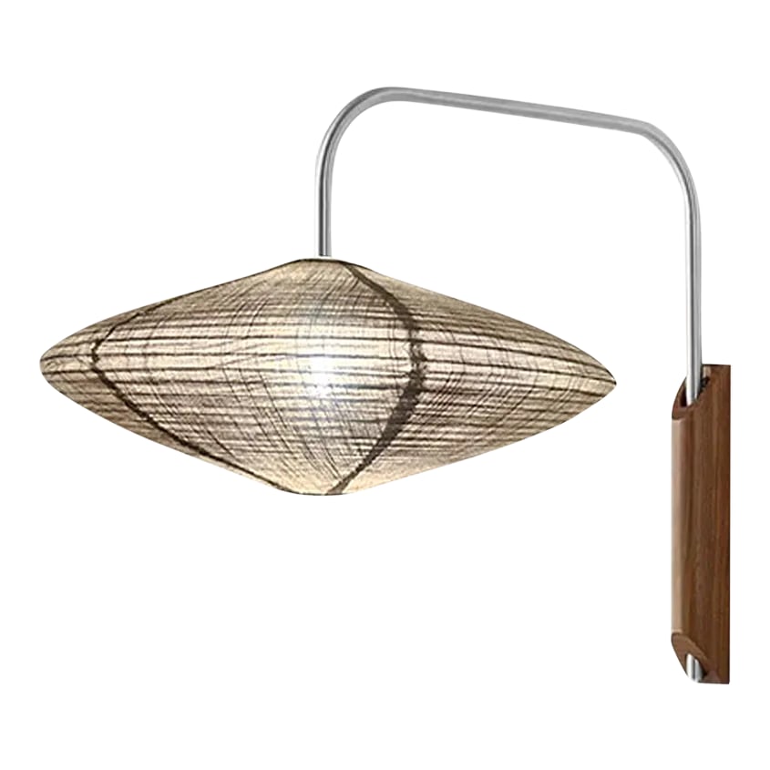 Roswell Wall Sconce - Matte Black, Handcrafted Shinpuru-Sa Linen-Cotton Shade, Plug-In: Transform your bedroom with the radiance of the Roswell Wall Sconce by NOVA of California. This plug-in sconce, part of the Roswell collection, exudes an air of intrigue with its harmonious blend of