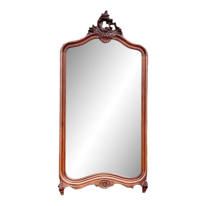 Antique 19th Century French Louis XV Style Carved Beech Over Mantle Mirror: A fine example of French Louie XV style in this antique 19th century hand carved beech over mantle mirror, having a hand cut wide double beveled and original plate, a hand carved arched and pierced