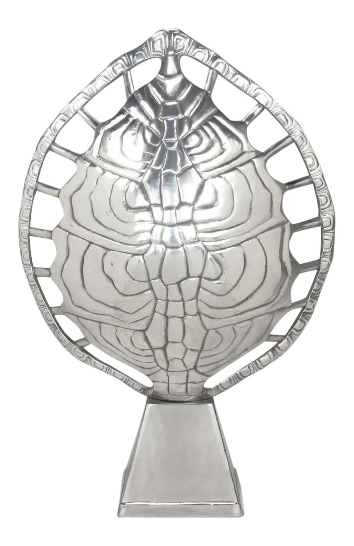 Arthur Court Polished Aluminum Tortoise Shell Lamp: Back lit, cast aluminum tortoise or turtle shell table lamp by Aurthur Court. Pierced opening surround the shell to let in as well as frame the piece. Mounted on a cast aluminum base and wired with a
