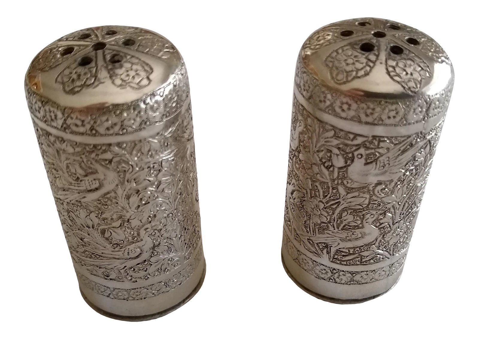 Vintage Silver Salt and Pepper Shakers - a Pair: Acquired while resident in Eritrea in the 1960's. Intricate Bird and floral design . Condition: Alterations: Original Condition Unaltered Imperfections: Some Imperfections Condition Notes: Fair to
