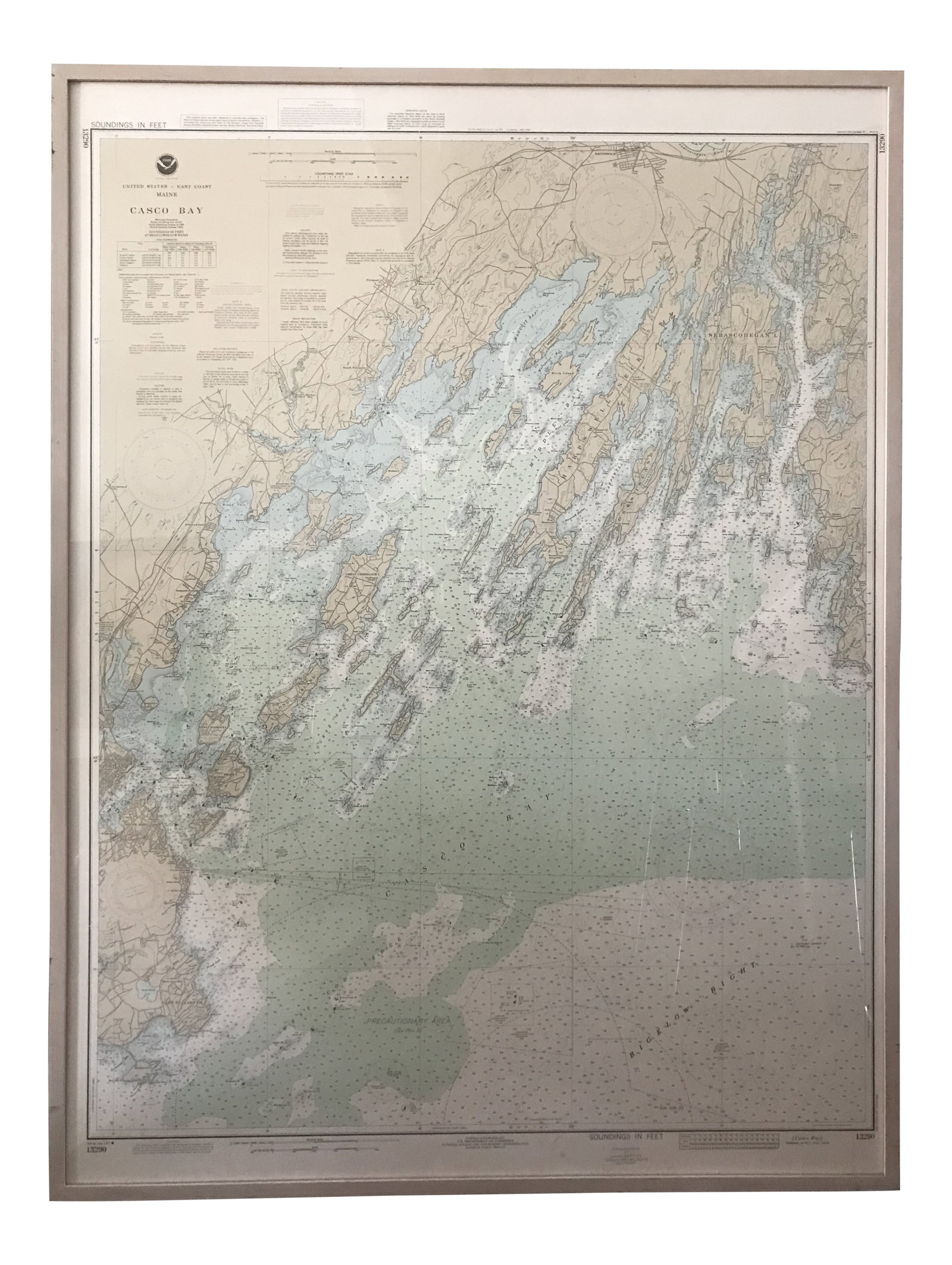Vintage Casco Bay Maine Framed Map: A detailed map of Casco Bay, Maine from the National Ocean Atmospheric Association (NOAA) in 1982. Print is in good condition with legible texts about river lengths, locational ports, and water