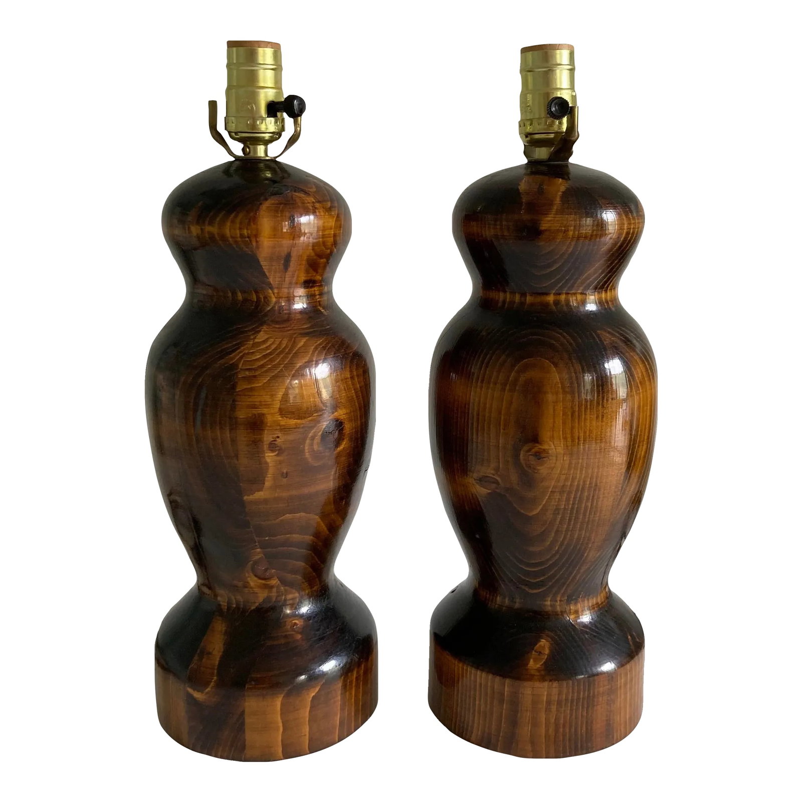20th Century, Pair of Turned Solid Wood Mid-Century Multi-Tone Wood Grain Lamps - High Gloss Varnish: A pair of solid, mid to late 20th century, turned wood table lamps featuring a multi-tone wood grain pattern in a high gloss varnish finish in a bulbous, curved shape. a beautiful pair! There is a