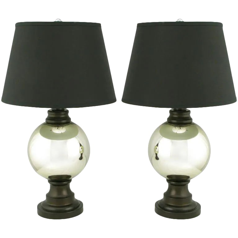 Spherical Mercury Glass Table Lamps - a Pair: A brilliant pair of mercury glass globe table lamps. The center glass globe is supported by a lacquered resin sculptural base and topped by a lacquered resin cap. Sold sans shades. Condition: