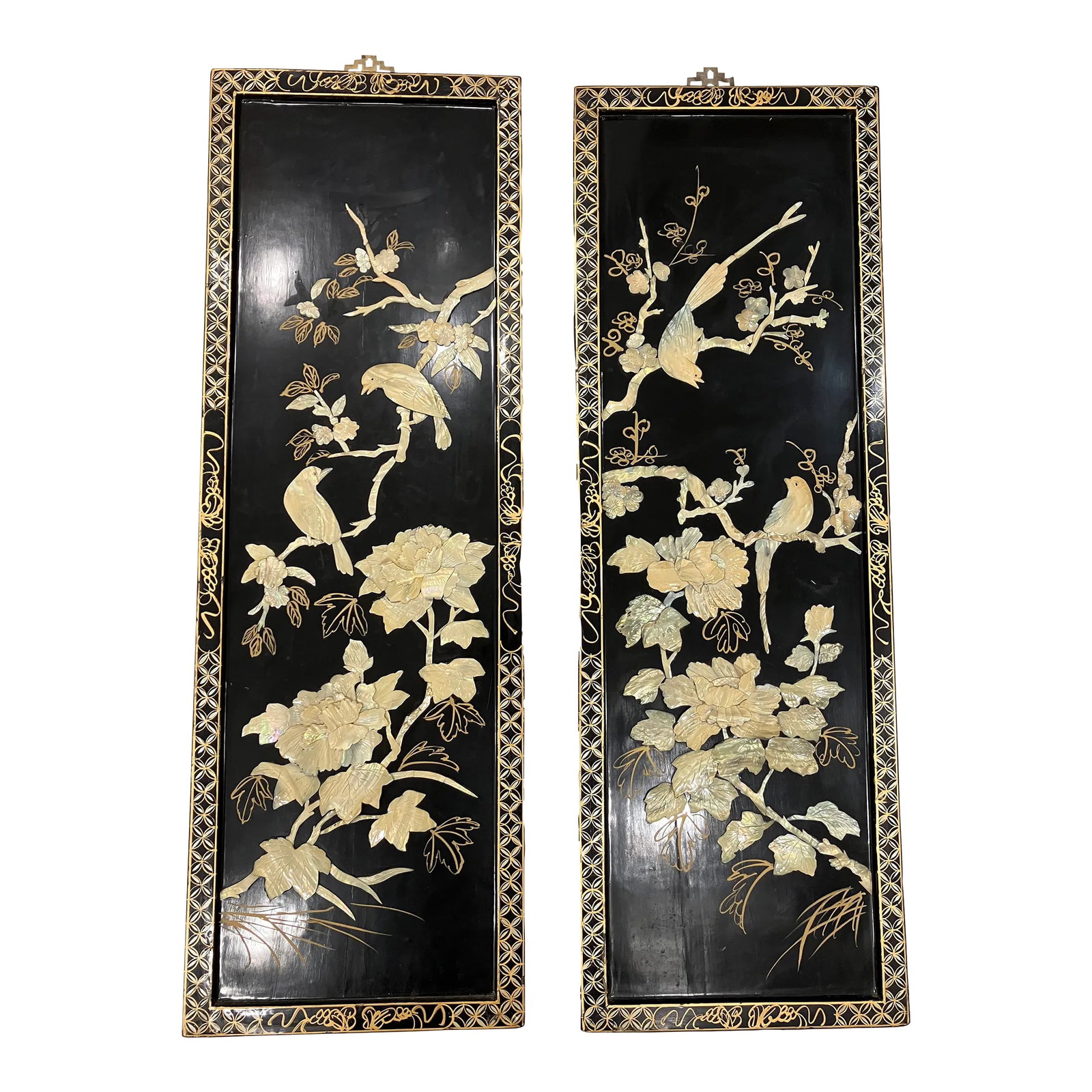 Pair of 1970s Chinese Mother of Pearl Inlay Panels: This highly detailed pair of lacquer panels was purchased in Hong Kong in the 70's The bird and foliage designs are all inlay in mother of pearl shell The outside edge is hand painted trellis design G