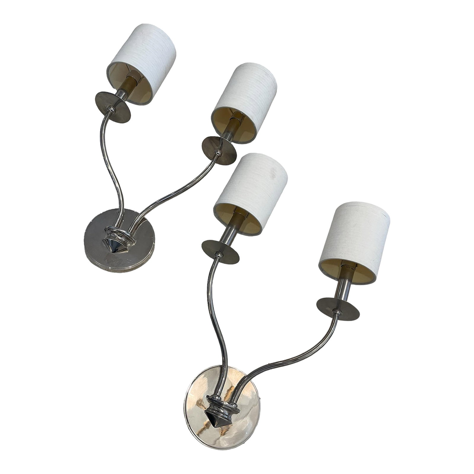 Pair of Vintage Silver Wall Sconces: Enhance your space with timeless charm using this pair of vintage silver sconces, each featuring two elegantly curved arms. These sconces exude classic sophistication with their vintage silver finish,