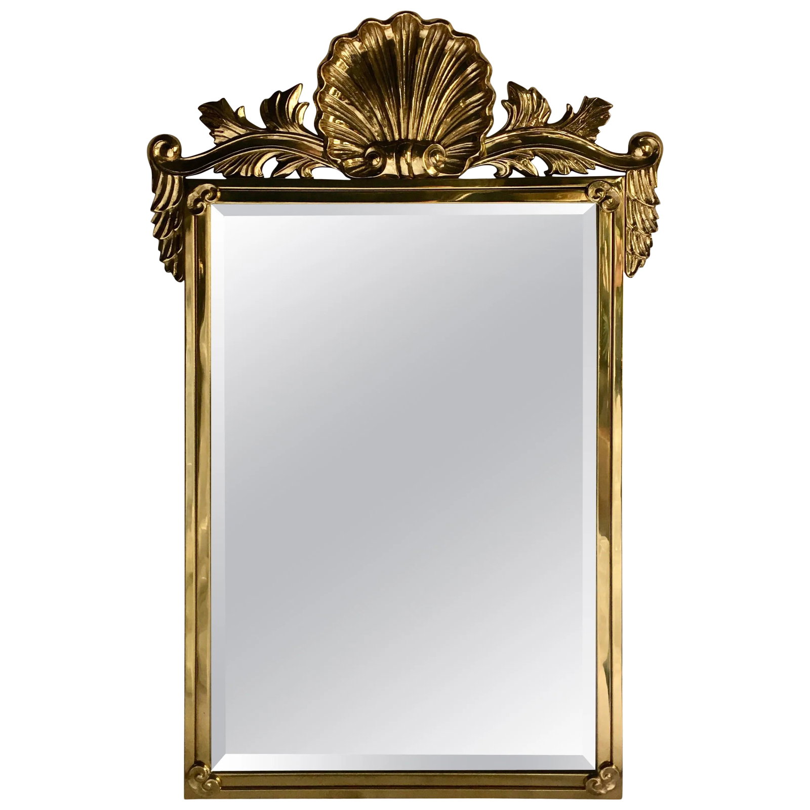 Mastercraft Style Brass Shell Motif Wall Mirror: Large polished brass decorative wall mirror in the style of Mastercraft. Rectangular form with finely cast shell motif. Condition: Alterations: Unknown Imperfections: Some Imperfections Condition