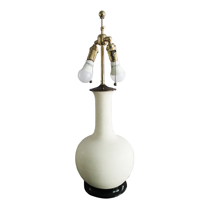Christopher Spitzmiller Large Matte Blanc De Chine Lamp: Illuminate your space with this stunning, large Christopher Spitzmiller lamp. Featuring a matt finish blanc de chine ceramic with a mahogany base and double socket cluster, this lamp is a classic