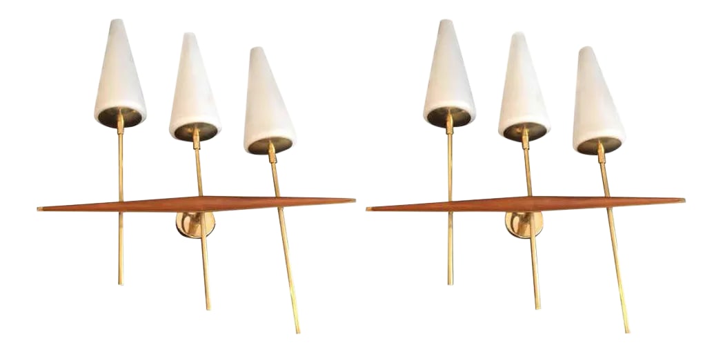 1960s French Teak and Brass Sconces - a Pair: A grand rare pair of large, 1960s French wall lights composed of teak and polished brass fixtures and white glass cone shades. Rewired. Condition: Alterations: Restored Imperfections: Some