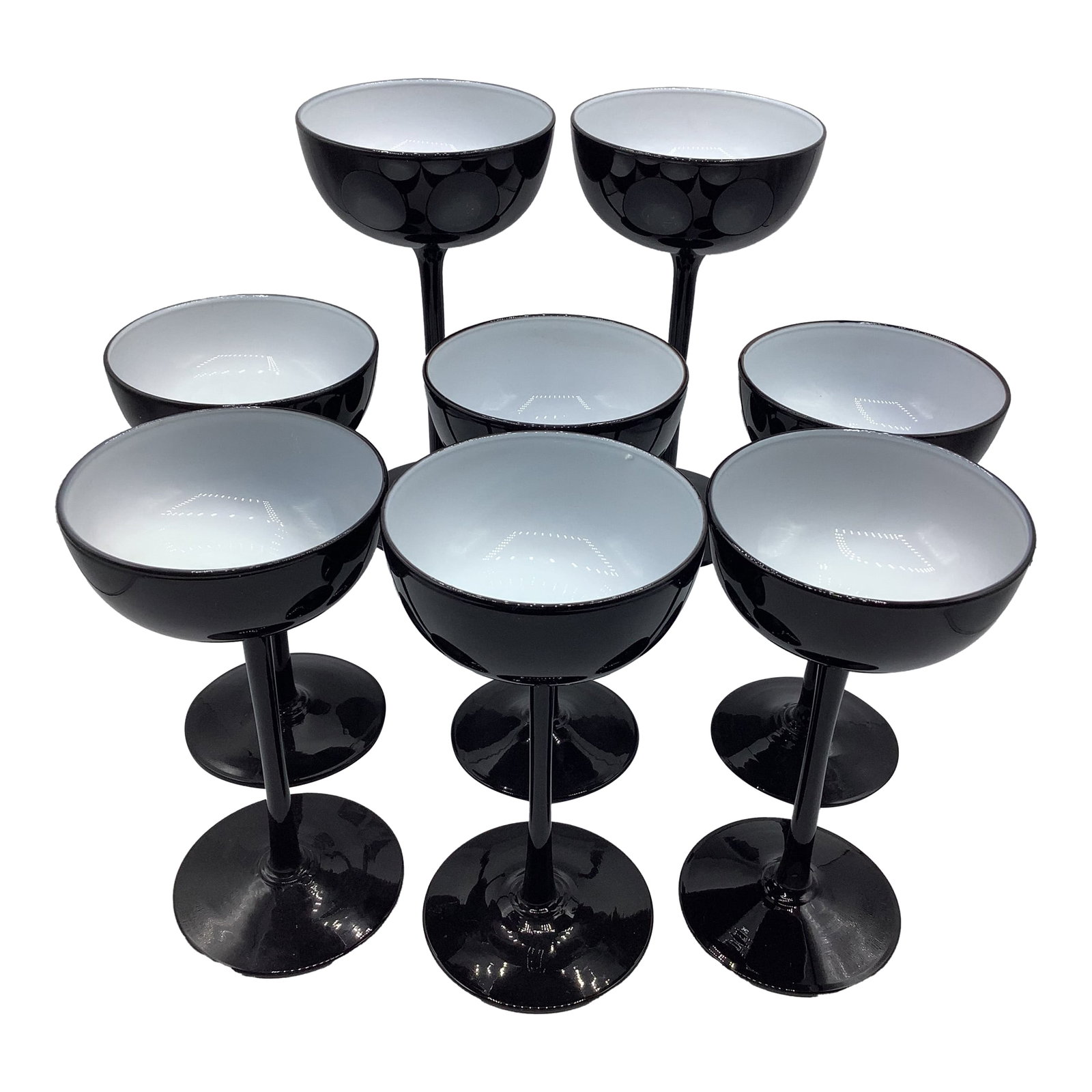 Vintage Carlo Moretti Italy Black White Cased Glass Tall Stem Champagne Coupes - Set of 8: A chic and elegant set of 7 vintage Carlo Moretti cased glass black and white tall stem Champagne Coupes. They measure 6 3/4" x 3 1/2" and are in excellent condition. These are very hard to find.