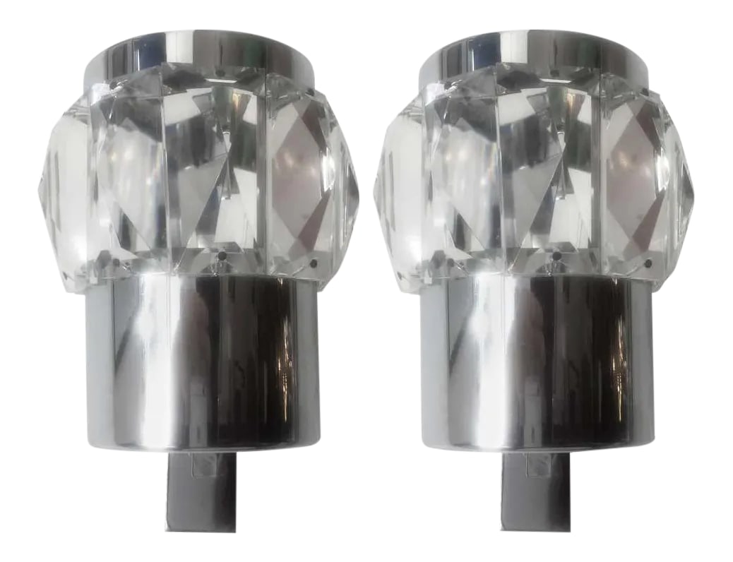 1960s German Space Age Wall Lights - a Pair: An original pair of 1960s German sconces composed of chrome bodies and thick cut crystal glass. Newly wired. Condition: Alterations: Restored Imperfections: Some Imperfections Condition Notes: