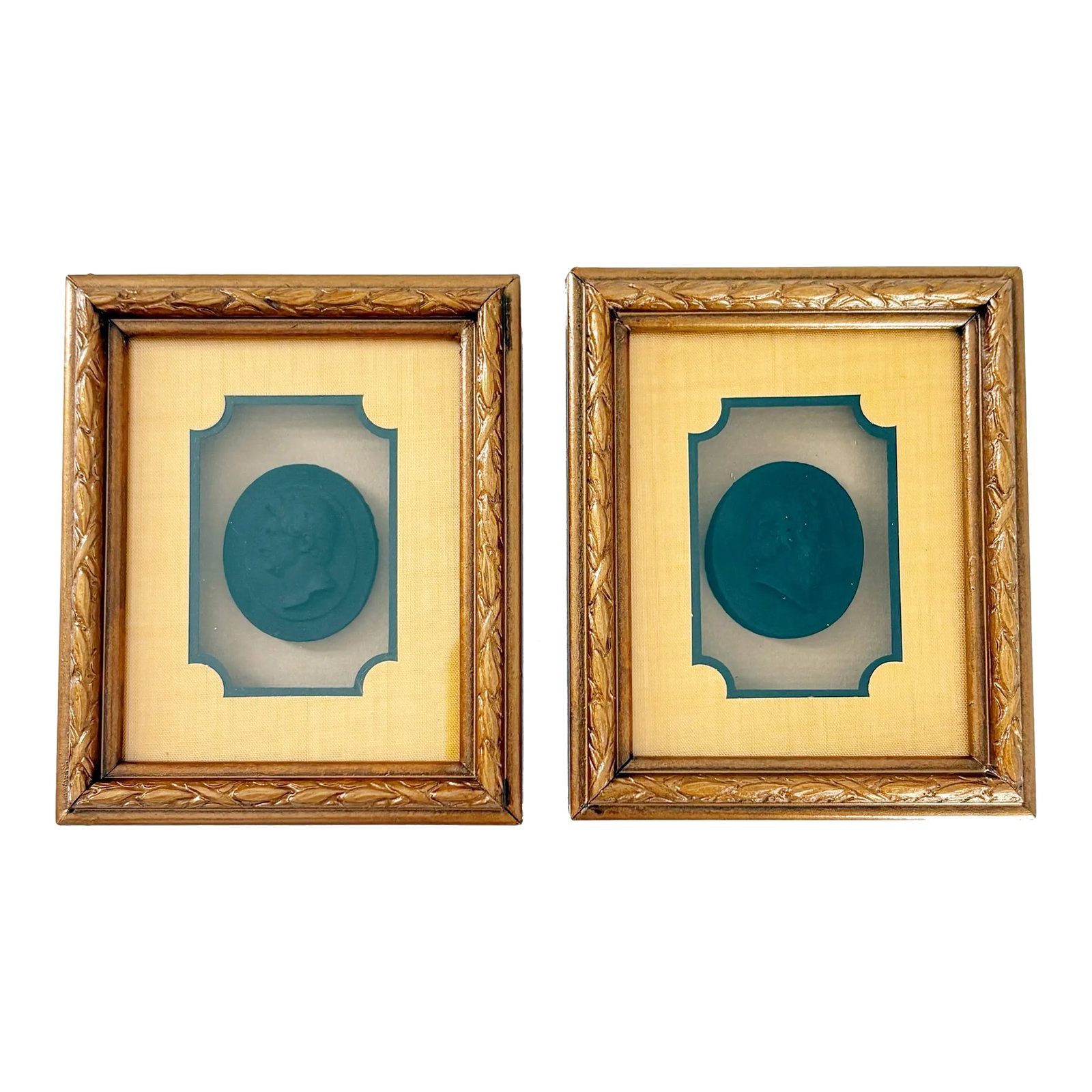 Hal Kramer Co. Framed Antique Black Cameo Intaglio Set- 2 Pieces: This beautiful set of antique cameo intaglios featuring two men facing each other (one has a beard the other clean shaven) is utterly breathtaking and a true testament to the grandeur of Hollywood