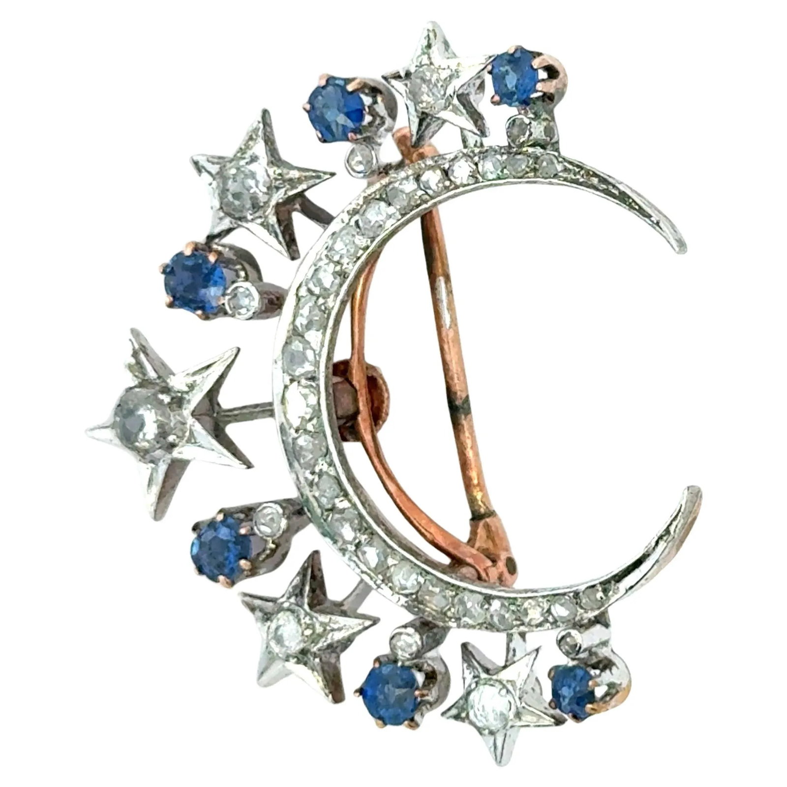 Victorian Diamond & Sapphire Crescent Moon Brooch in 18K Gold and Platinum: A romantic celestial brooch from the Victorian era, crafted in 18K yellow gold with a platinum top. The crescent moon is set with approximately 2.00 carats of rose-cut diamonds, accented by
