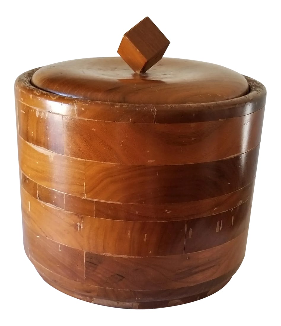 Mid-Century American Walnut Weathered Ice Bucket With Lid Glass Liner: We love this extraordinary ice bucket for the beautiful walnut construction, geometric walnut cube pull on the top of the lid and unique glass insert. There are cracks and scratches on the exterior;
