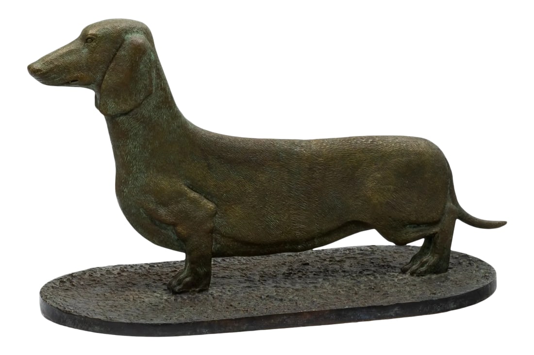 Mid 20th Century Dachshund Bronze Sculpture with Boot Scraper: This mid-century cast bronze dachshund dog sculpture was made by Maitland-Smith. The sculpture can also be used as a front door boot scraper, with stylized vertigree patina, an attractive addition to