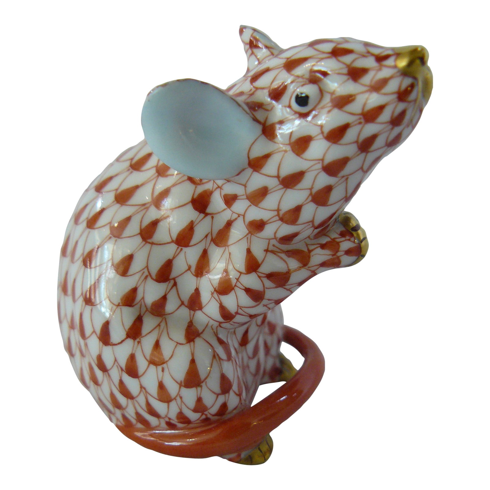 Herend Rust Fishnet Mouse: Adorable rust fishnet sitting mouse with pale blue ears and 24K gold accents. No sign of wear or use. Excellent condition. Height: 2.25" Width: 1.675" Length: 2.5 Condition: Alterations: Original