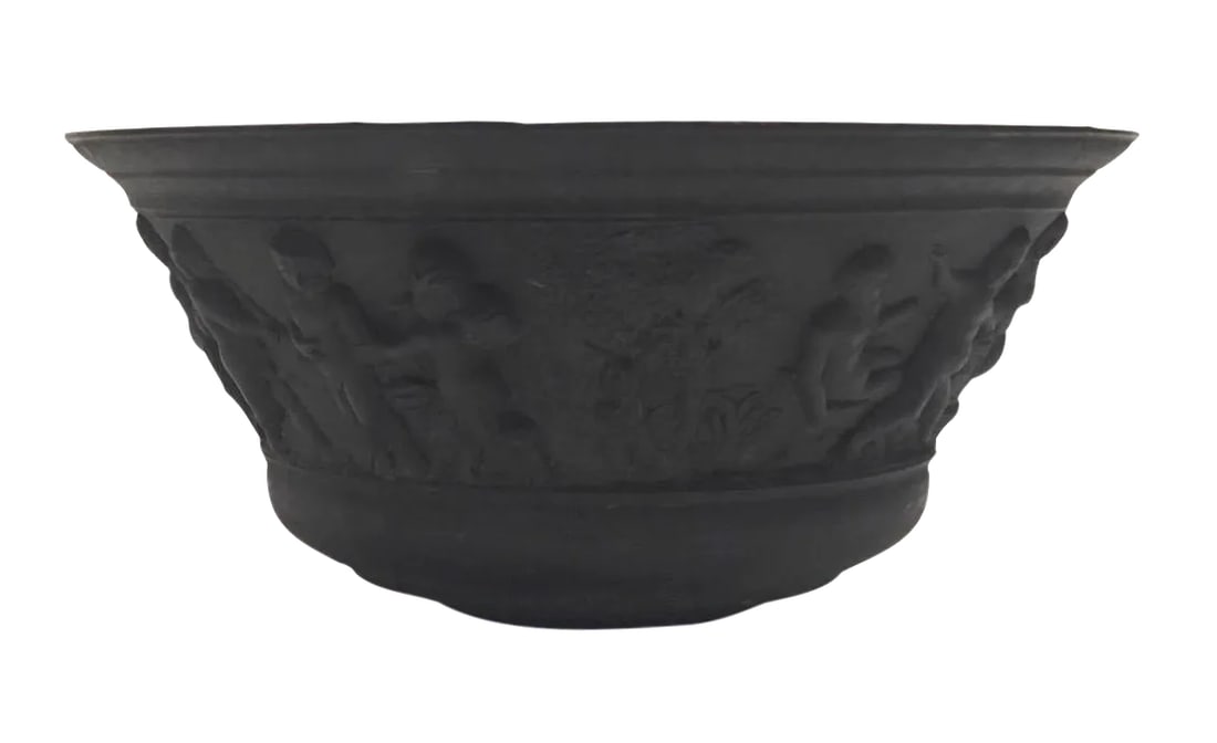 19th-Century Grand Tour Bronze Bowl: A round Grand Tour 19th-Century bowl or basin embellished with cherubs and satyrs. Wear is consistent with age; patina show signs of wear, one small dign in the rim. Condition: Alterations: Original