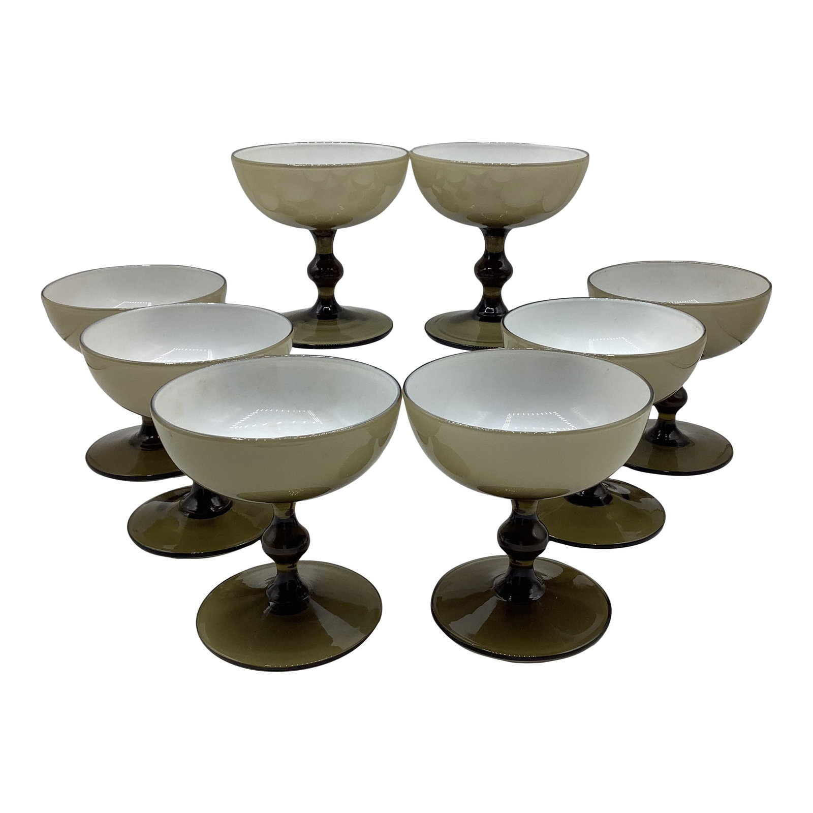 Vintage Carlo Moretti Italy Smoke Taupe White Cased Glass Champagne Coupes Glasses - Set of 8: A Rare and gorgeous set of mid century hand blown Carlo Moretti cased glass champagne coupes in the very elegant and versatile smoke taupe cased in white. They are in excellent condition and measure