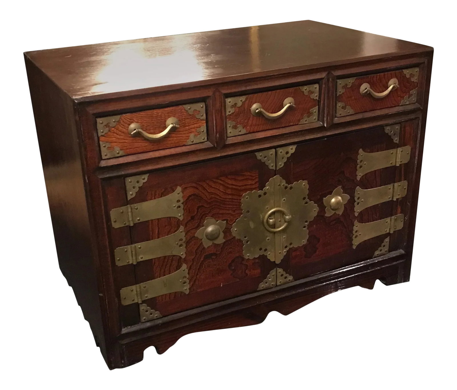 Mid 20th Century Korean Jewelry Organizer: A Korean hardwood diminutive chest with brass mounts. The two doors open to reveal storage and drawers with three drawers along the top. The highly figurative wood on the front door and drawer panels