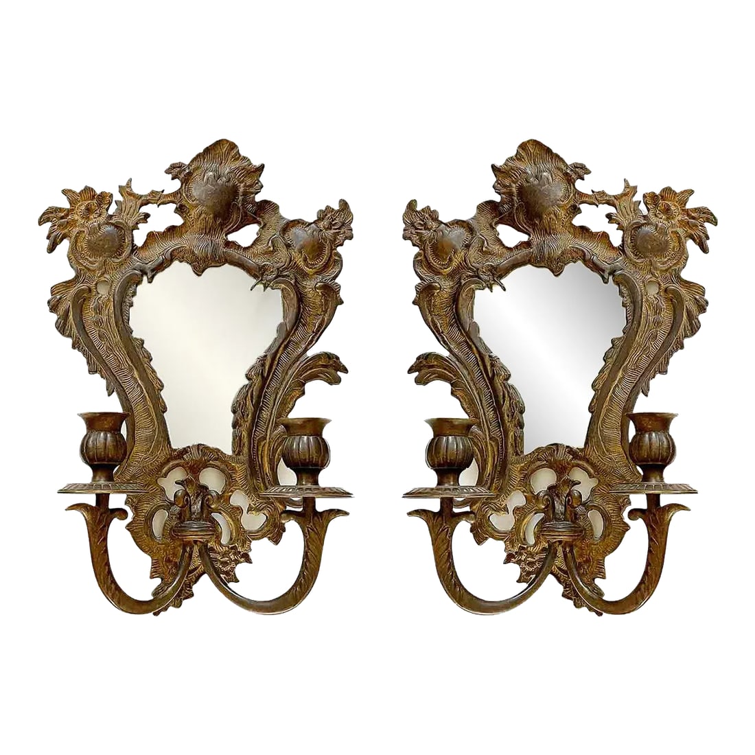 Antique Bronze Wall Sconces - A Pair: Pair of antique early 20th century bronze wall sconces. Features intricate, ornate detailing characteristic of 18th and 19th-century French Rococo design, including acanthus leaves and scrollwork.