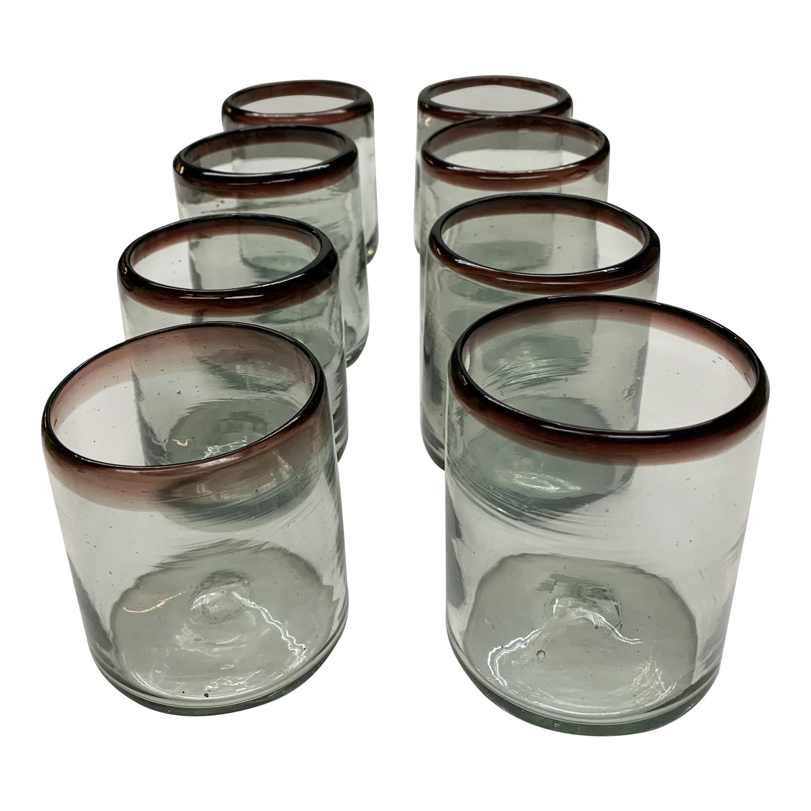 Vintage Mexican Glassware - Set of 8: This is a glassware set of 8. They are all individually hand blown glass made in San Miguel de Allende. 8 of the drinking glasses have a wine red accent trimming the rim. Great set for any kitchen or