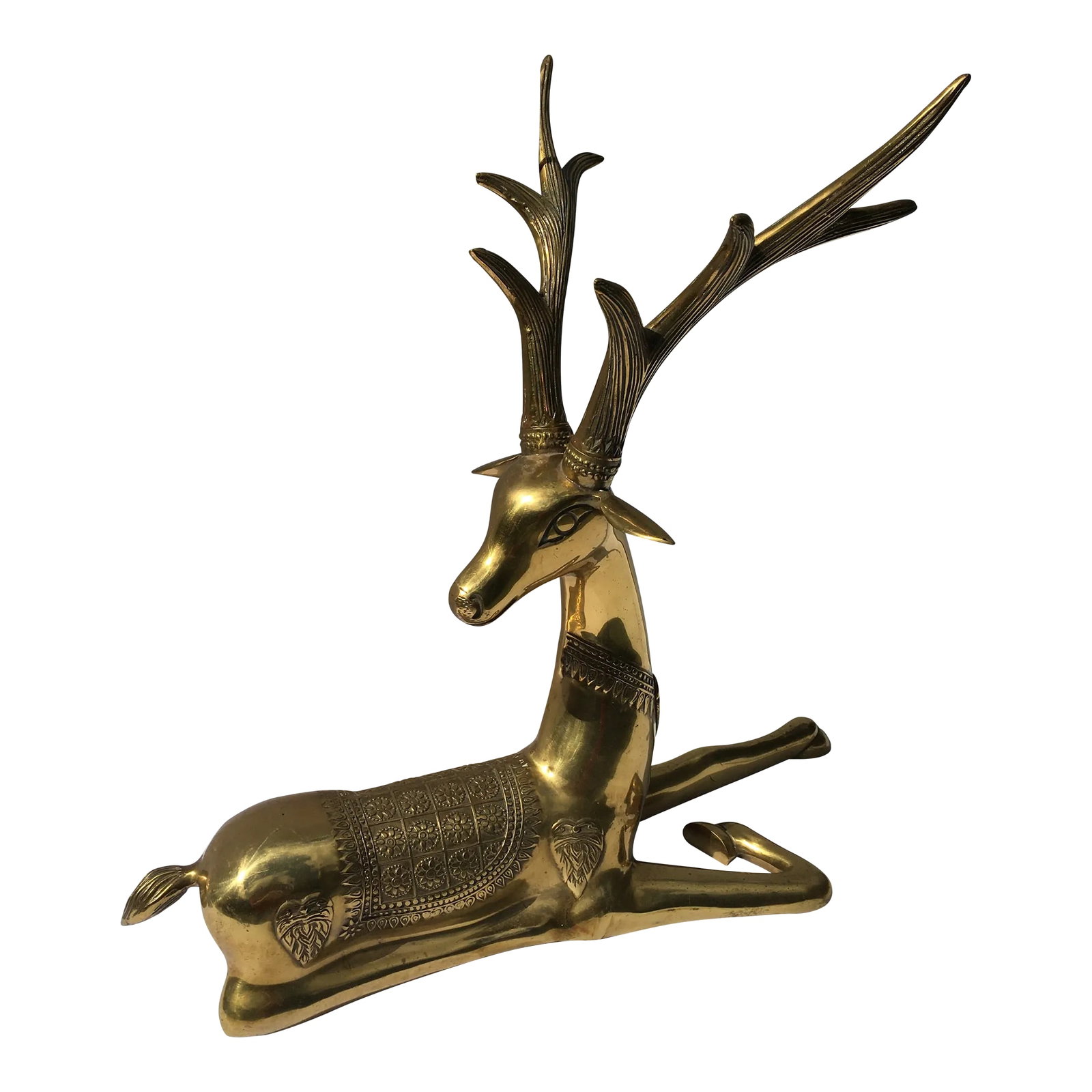 1970s Recumbent Brass Deer: This large scale deer is probably a piece from Sarreid in the 70's. At 27 inches in height & 29 inches in length it has a strong statement The antlers screw off for easy shipment Condition: