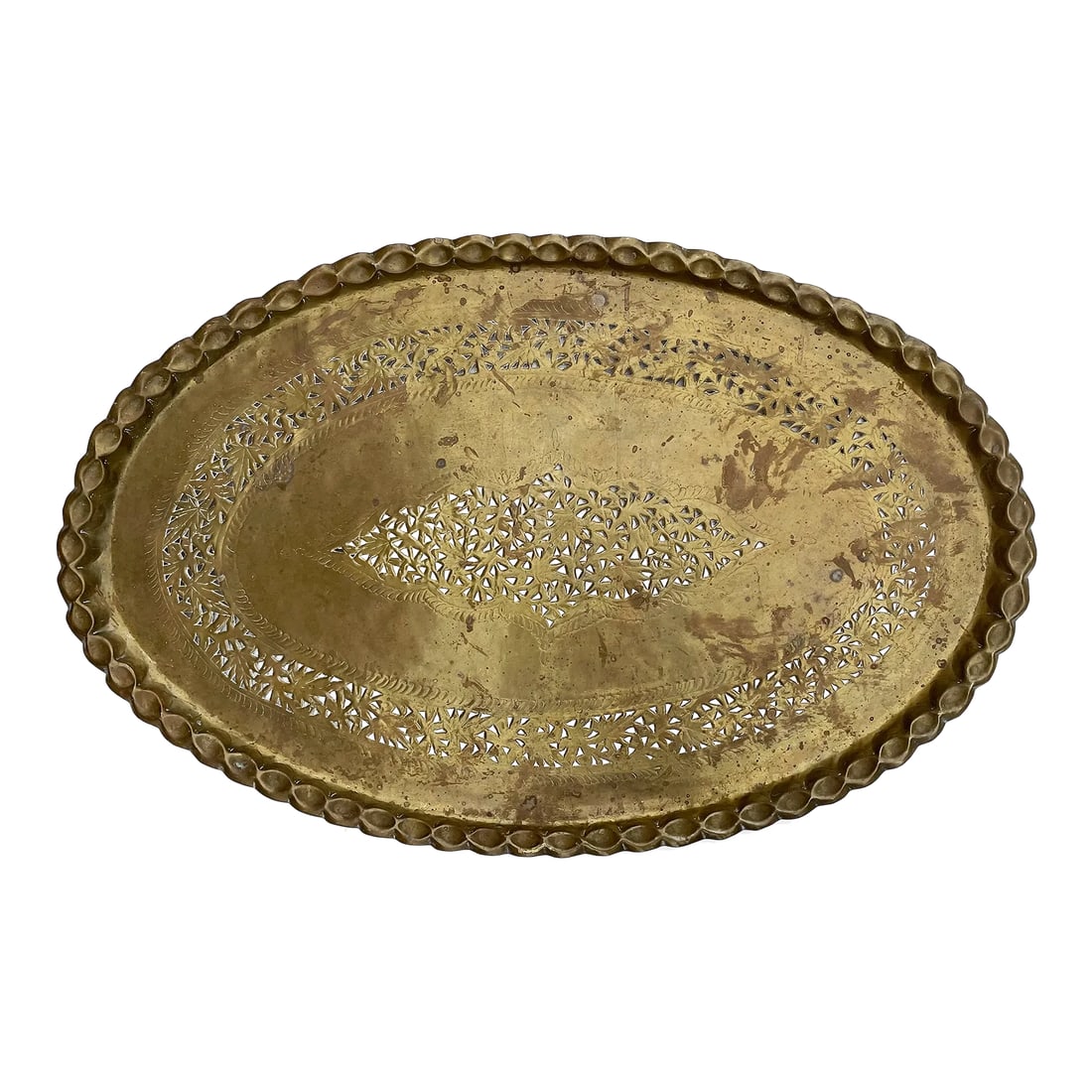 Vintage Brass Tray With Decorative Detail: Vintage large oval brass decorative tray. Perforated design at the center and towards the border. Condition: Alterations: Original Condition Unaltered Imperfections: Some Imperfections Condition