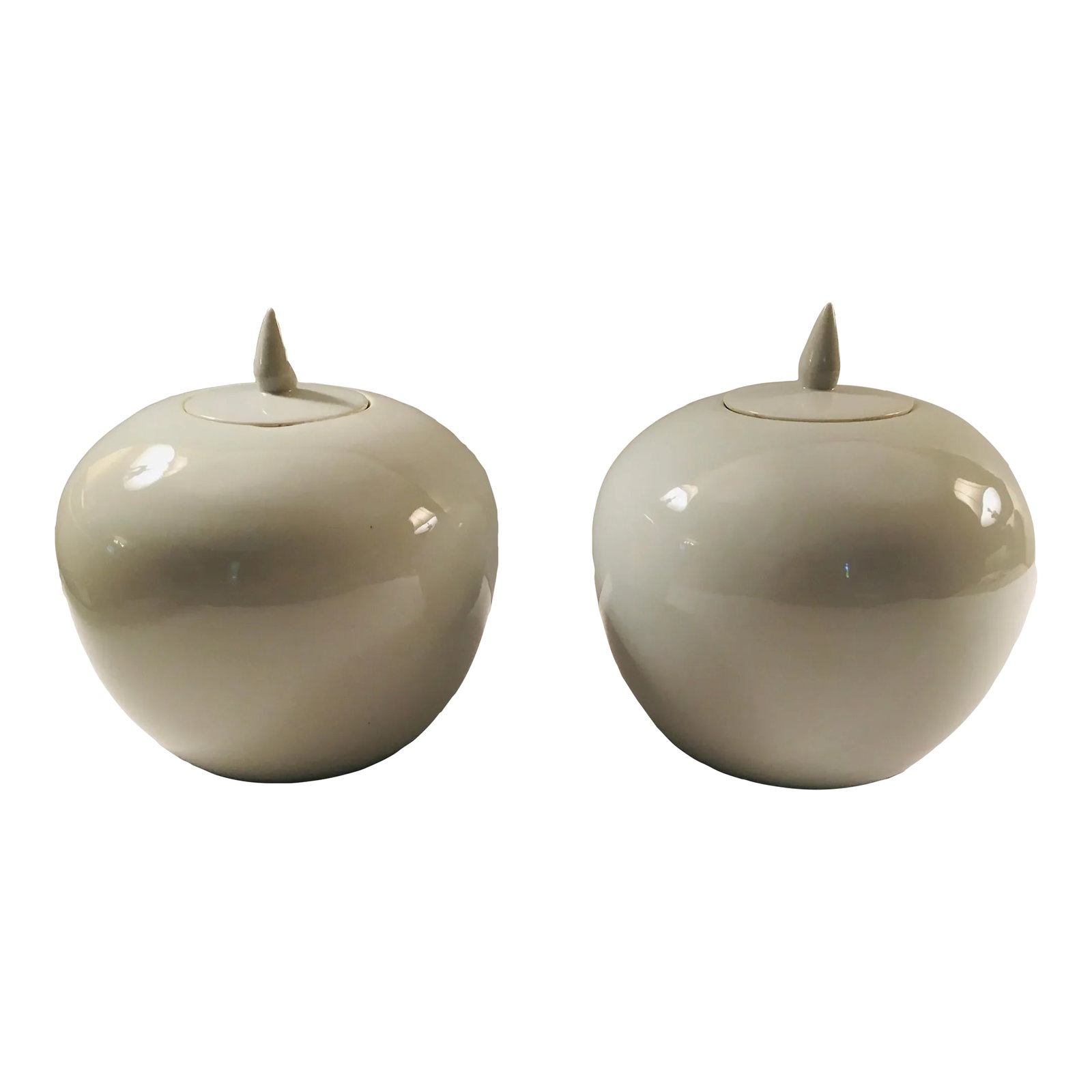 1970s Blanc De Chine Covered Jars - a Pair: This pair of melon shaped jars have their original covers. These were made in the 70's in Taiwan for Robel & Co They are in perfect condition Condition: Alterations: Original Condition Unaltered