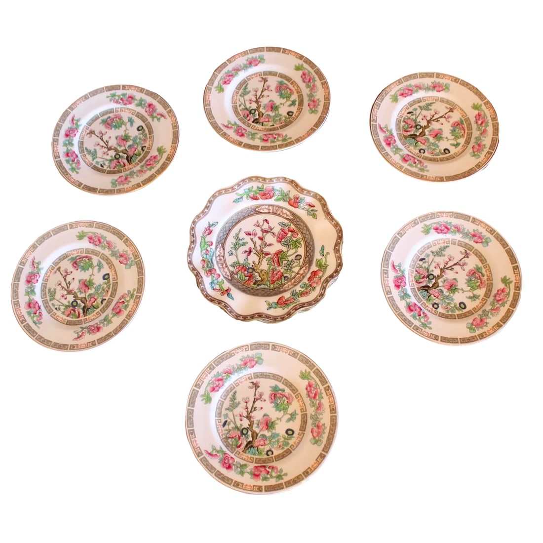 "Indian Tree" Pattern Porcelain Dessert/Bread Plate Set, 8 Pieces: A bright and colorful group of Indian Tree pattern porcelain, for display or use, comprised of 2 scalloped plates, ca. 1900, by esteemed English porcelain manufactory founded in the 18th century,