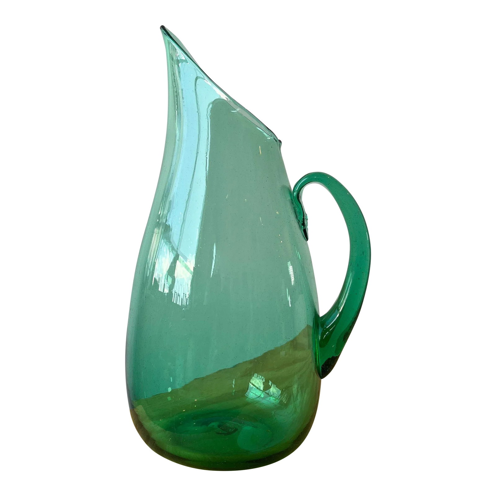 Vintage Mid-Century Teal Blown Glass Pitcher Attributed to Winslow Anderson for Blenko, Circa 1960s: Vintage Mid-Century Teal Blown Glass Pitcher Attributed to Winslow Anderson for Blenko, Circa 1960s. Bulbous hand-blown form with a generous well, exaggerated spout and applied handle. Unsigned with