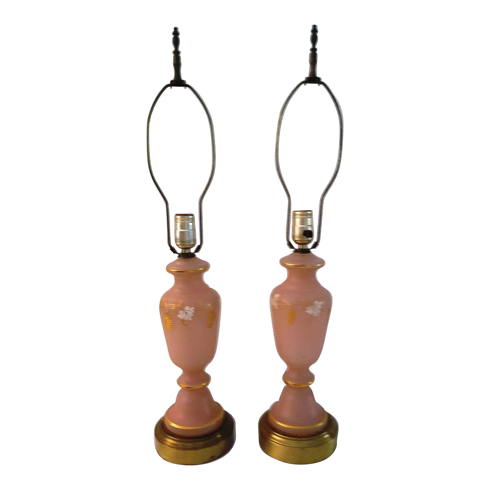 1950s Pink Frosted Glass Grape Vine Lamps, a Pair: Pretty pair of light pink frosted glass lamps with brass bases. Frosted pink glass features a delicate hand-painted grapevine motif around perimeter in gold and white with gold accent bands. Original
