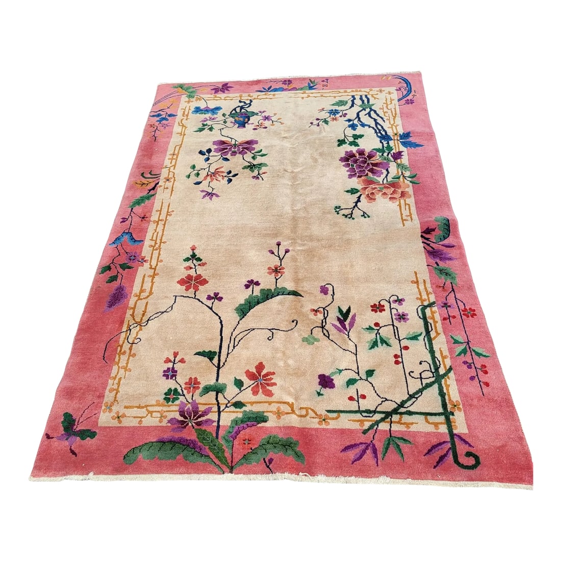 1940s Chinese Nichols Carpet Color Full 7 X 5: This is a very color full carpet with a creamy dreamy field with a soft rose frame. The way it is laid out reminds me of the principles of ikebana flower arranging. The law of three is utilized