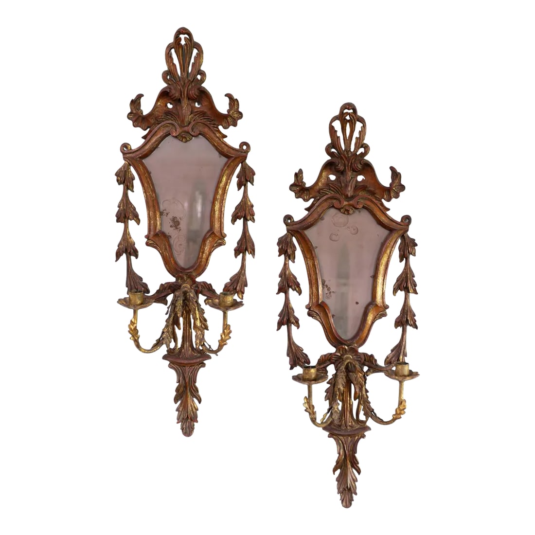 Early 20th Century Carved Italian Giltwood Girandole Mirror Sconces - a Pair: A very stylish, elegant pair of early to mid 20th century Italian giltwood girandole mirrors. The expertly-crafted frames are entirely hand carved from wood and include metal candleholders with tole