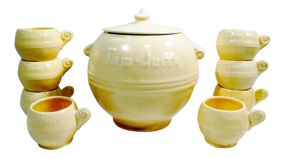 Metlox Poppytrail Tom & Jerry Punch Set - 9 Pieces: Iconic 9 piece Poppytrail Series 200 Tom & Jerry California pottery party or punch set from Metlox. All in light yellow, set includes: 7.5" dia and 8" tall covered ball form covered punch bowl with 8