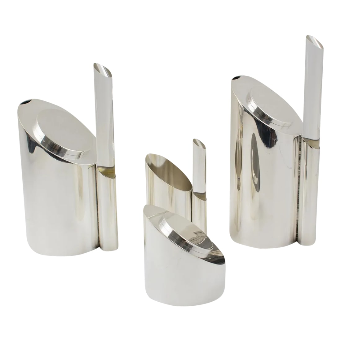 Memphis Style Silver Plate and Lucite Tea and Coffee Set by Guildart France: A sophisticated French modernist Memphis-style coffee or tea serving set. The set features a coffee pot, teapot, creamer, and sugar pot with a sculptural polished silver plate metal body and clear
