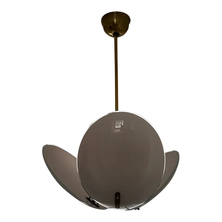 Mid-Century Modern Brass and Milk Glass Ceiling Pendant Light: French mid century elegant and refined brass and glass pendant. Pendant has 3 glass pieces attached to the base of the pendant. Glass sits under the 3 bulb pendant which project light up, creating a