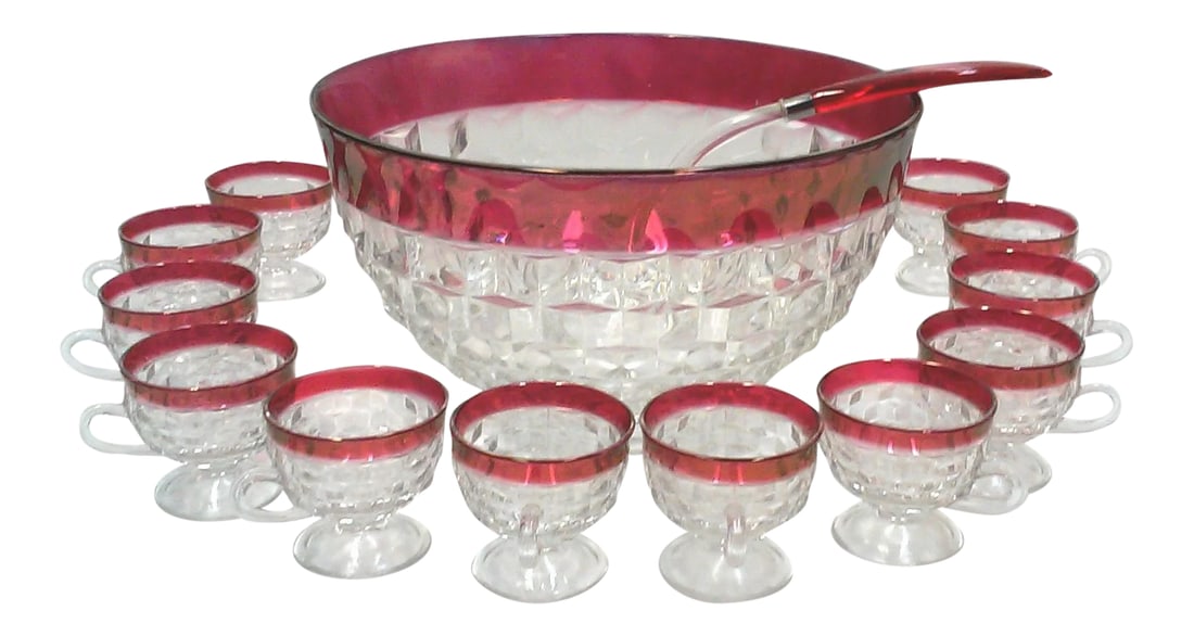 Faceted Cranberry Punch Bowl, Cups & Ladle - 14 Pieces: Serve up some holiday cheer in this spectacular glass punch bowl and twelve matching footed cups all with cranberry red colored rims. This vintage serving bowl and cups is made of thick and heavy