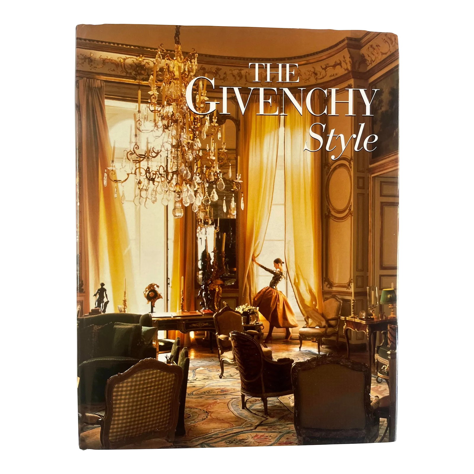 Givenchy Style, by Francoise Mohrt, Vendome Press, 1998: 1998 first American edition, The Vendome Press (New York), 9 3/8 x 12 inches tall black cloth hardcover in publisher's unclipped dust jacket, gilt lettering to front cover and spine, copiously