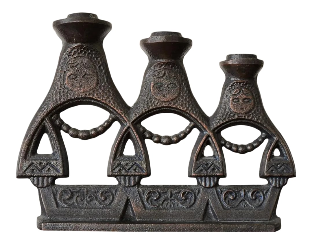 Mid-Century Cast Iron Russian Matryoshka Candelabra: Very unique and rare vintage cast iron Russian matryoshka 3-candle candelabra. Very reminiscent of the nesting babushka dolls with 3 figures in succession in size. This candelabra will hold 3/4"