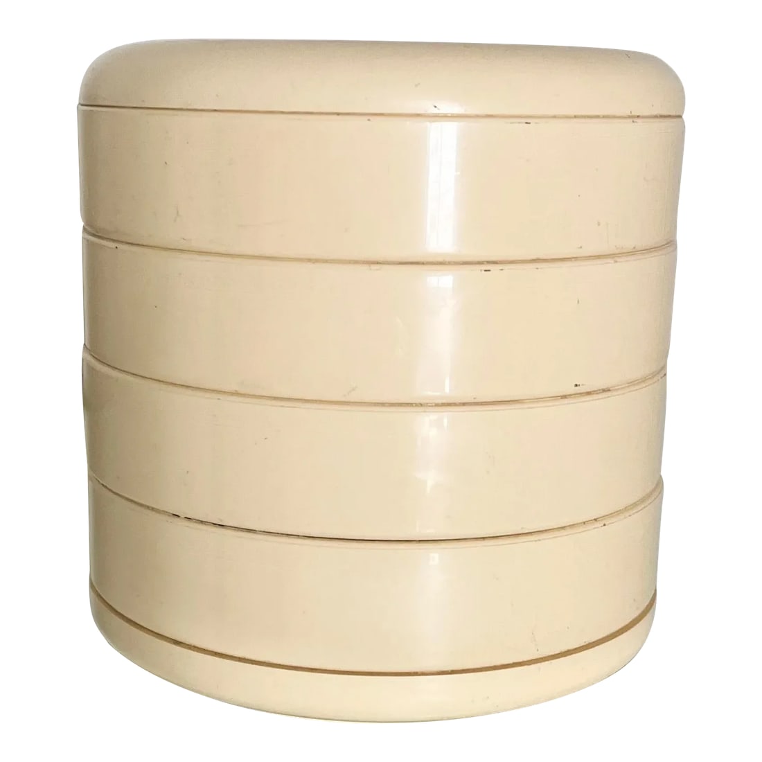 1980s Postmodern Interdesign Swivel Caddy in Off-White: 1980s Postmodern Interdesign Swivel Caddy This butter cream round swivel organizer is ideal for bringing order to your desk, adding 80's fun to your vanity, or organizing your jewelry with ease. Its